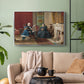 Silver floater framed canvas featuring a family group portrait with warm interior tones, displayed above a sofa in a modern living room.