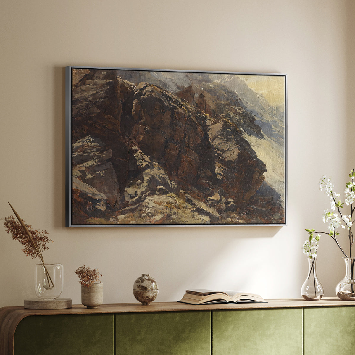 Silver floater framed canvas of High Mountain Study, c. 1870 by Edward Theodore Compton, featuring a detailed study of rugged mountain landscape with sharp contours above a sideboard in a softly lit hallway.