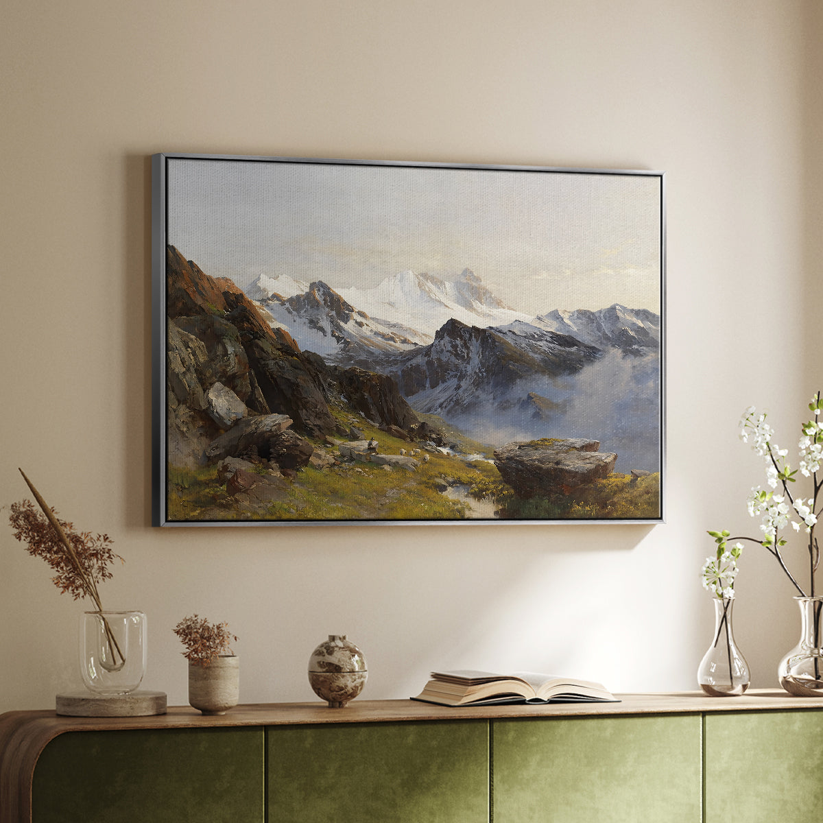 Silver floater framed canvas of The Großglockner from the Prager Hut, 1890 by Edward Theodore Compton, featuring a mountain summit seen from elevated viewpoint with surrounding landscape above a sideboard in a softly lit hallway.