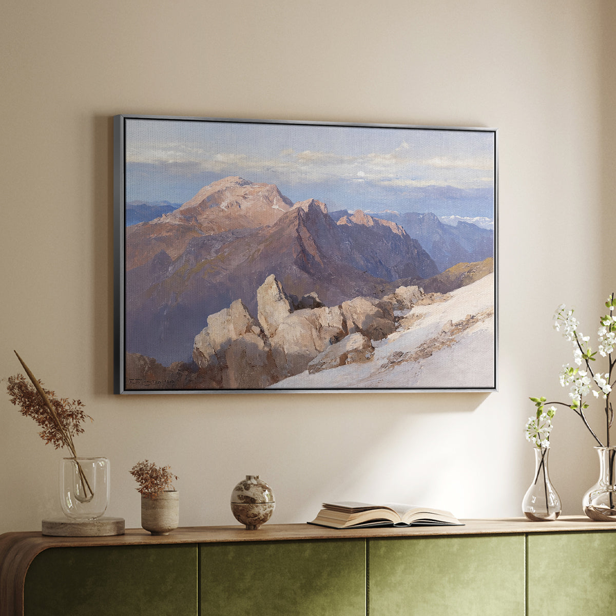 Silver floater framed canvas of Hoher Göll from Watzmann-Hocheck, 1919 by Edward Theodore Compton, featuring an alpine panorama showing layered peaks and valleys above a sideboard in a softly lit hallway.