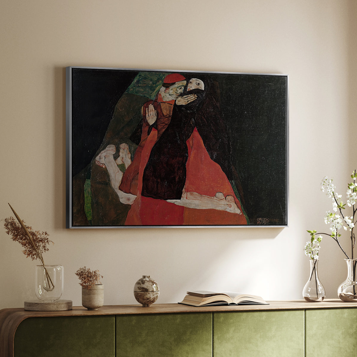 Silver floater framed canvas of Cardinal and Nun (Caress), 1912 by Egon Schiele, featuring a cardinal and nun depicted in close emotional interaction above a sideboard in a softly lit hallway.