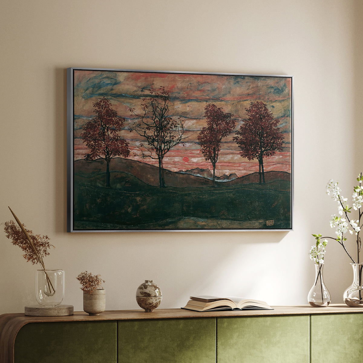 Silver floater framed canvas of Four Trees, 1917 by Egon Schiele, featuring a minimal landscape with grouped trees and expressive color above a sideboard in a softly lit hallway.
