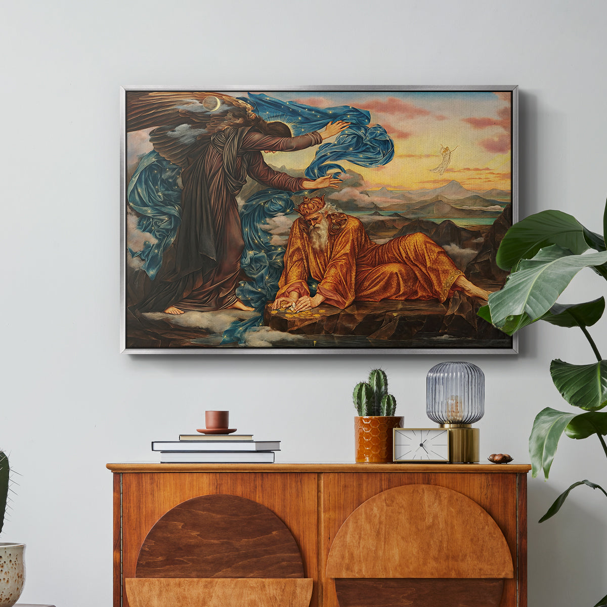 Earthbound, 1897 by Evelyn De Morgan in a silver floater framed canvas featuring a reclining female figure surrounded by symbolic elements in dreamlike setting, displayed above a wood console cabinet.
