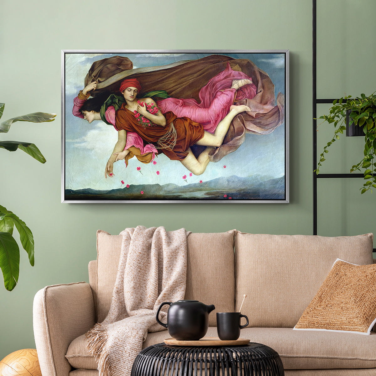 Silver floater framed canvas featuring an allegorical painting of intertwined figures in celestial setting, displayed above a sofa in a modern living room.