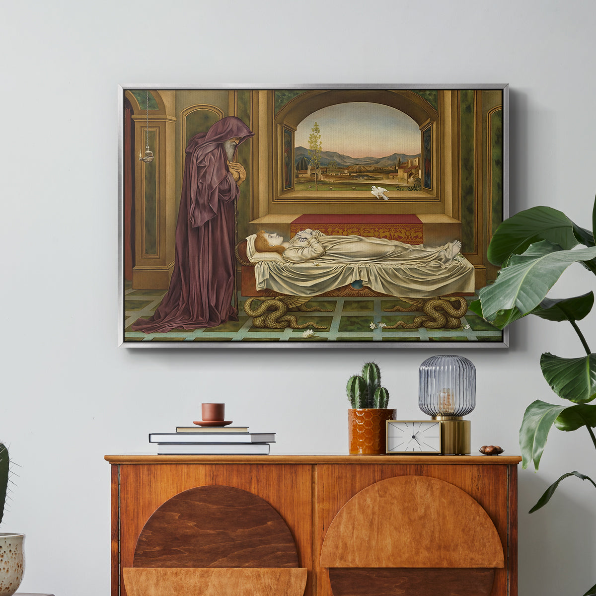 The Wandering Jew: Whom the Gods Love Die Young, 1888 by Evelyn De Morgan in a silver floater framed canvas featuring a solitary figure standing in interior space with contemplative expression, displayed above a wood console cabinet.