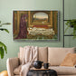 Silver floater framed canvas featuring a narrative composition with figure paused in reflective moment, displayed above a sofa in a modern living room.