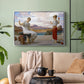 Silver floater framed canvas featuring an elegant composition of women performing domestic task, displayed above a sofa in a modern living room.