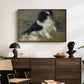 Tama, the Japanese Dog, c. 1876 by Pierre-Auguste Renoir displayed in a walnut floater framed canvas above a dark wood credenza in an entryway.