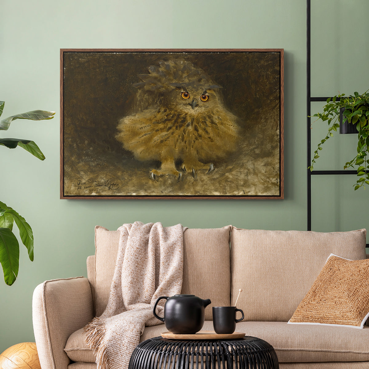 Walnut floater framed canvas featuring a realistic depiction of owl camouflaged within woodland environment, displayed above a sofa in a modern living room.