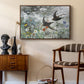 Common Swifts, 1886 by Bruno Liljefors as a walnut floater framed canvas featuring a multiple birds flying together in natural outdoor scene, styled above a mid-century console in a contemporary living area.