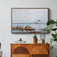 Greylag Geese (Grågäss), 1922 by Bruno Liljefors in a walnut floater framed canvas featuring a group of geese gathered near water in a natural wetland landscape, displayed above a wood console cabinet.