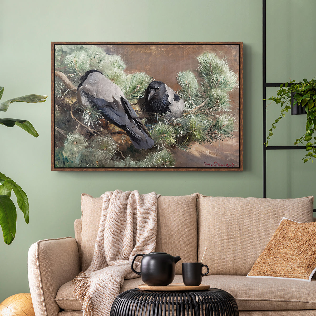 Walnut floater framed canvas featuring a wildlife painting of dark birds against muted landscape, displayed above a sofa in a modern living room.