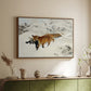 Walnut floater framed canvas of Fox in Snow Landscape, 1900 by Bruno Liljefors, featuring a wildlife scene of fox moving swiftly through winter terrain above a sideboard in a softly lit hallway.