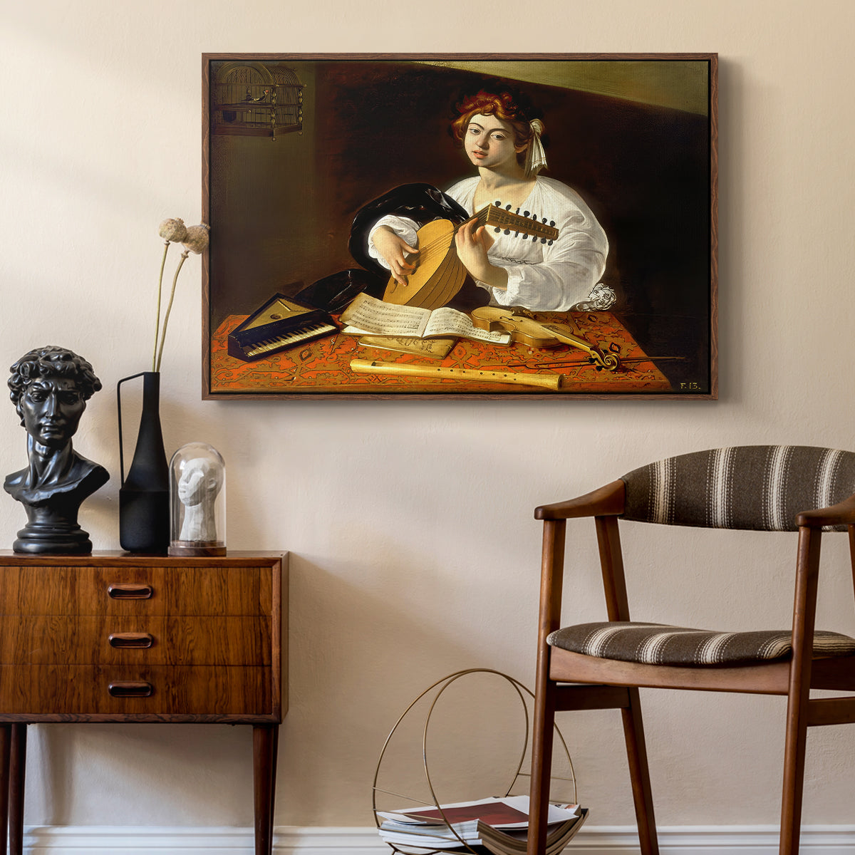 The Lute Player (Wildenstein Version), c. 1596 by Caravaggio as a walnut floater framed canvas featuring a detailed scene of youth playing string instrument with fruit and flowers nearby, styled above a mid-century console in a contemporary living area.