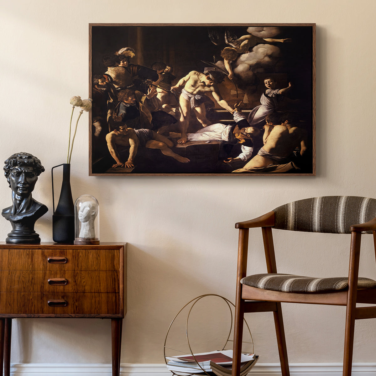 The Martyrdom of Saint Matthew, 1599-1600 by Caravaggio as a walnut floater framed canvas featuring a religious narrative showing violent attack on saint in crowded setting, styled above a mid-century console in a contemporary living area.