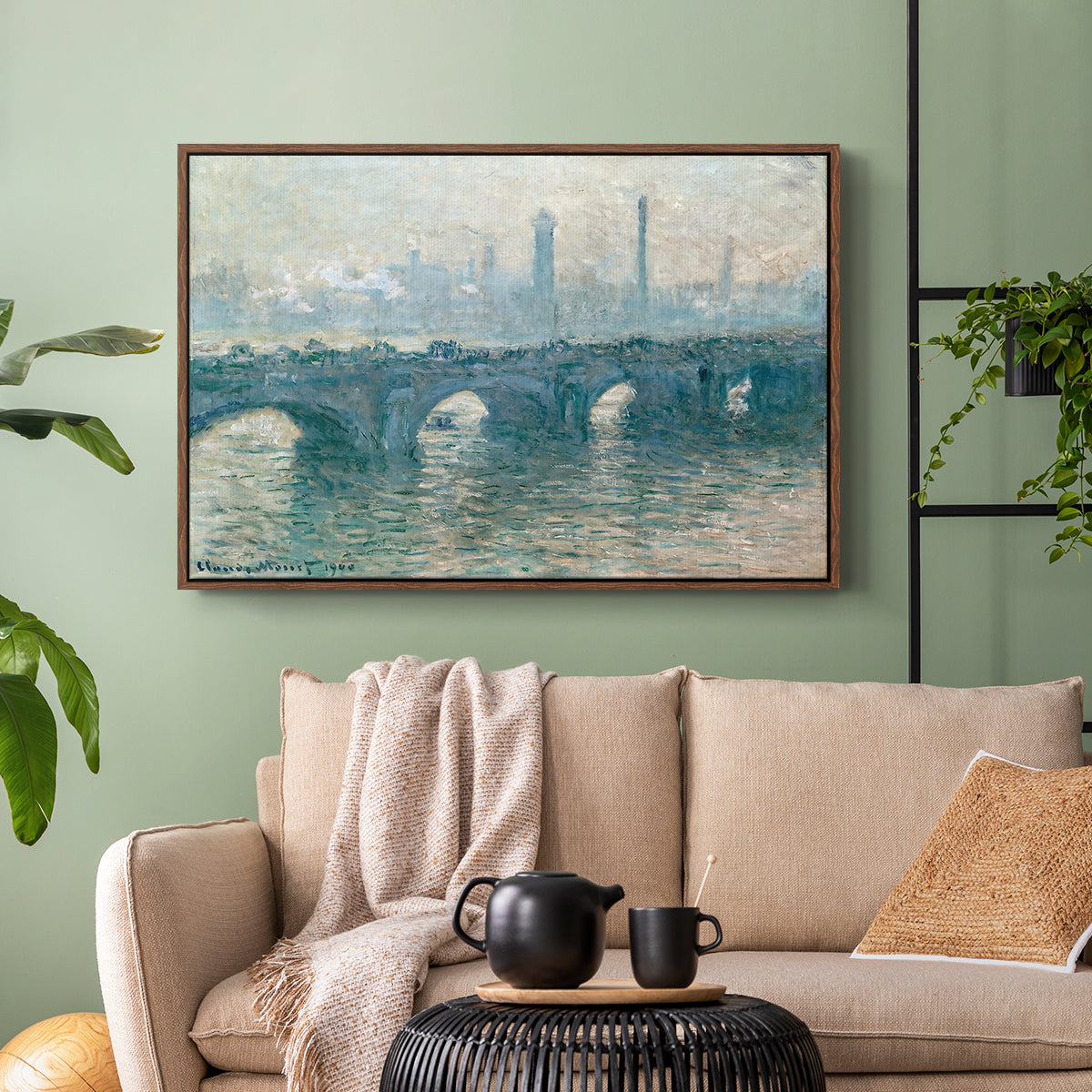 Walnut floater framed canvas featuring an atmospheric urban landscape with misty light and reflections, displayed above a sofa in a modern living room.