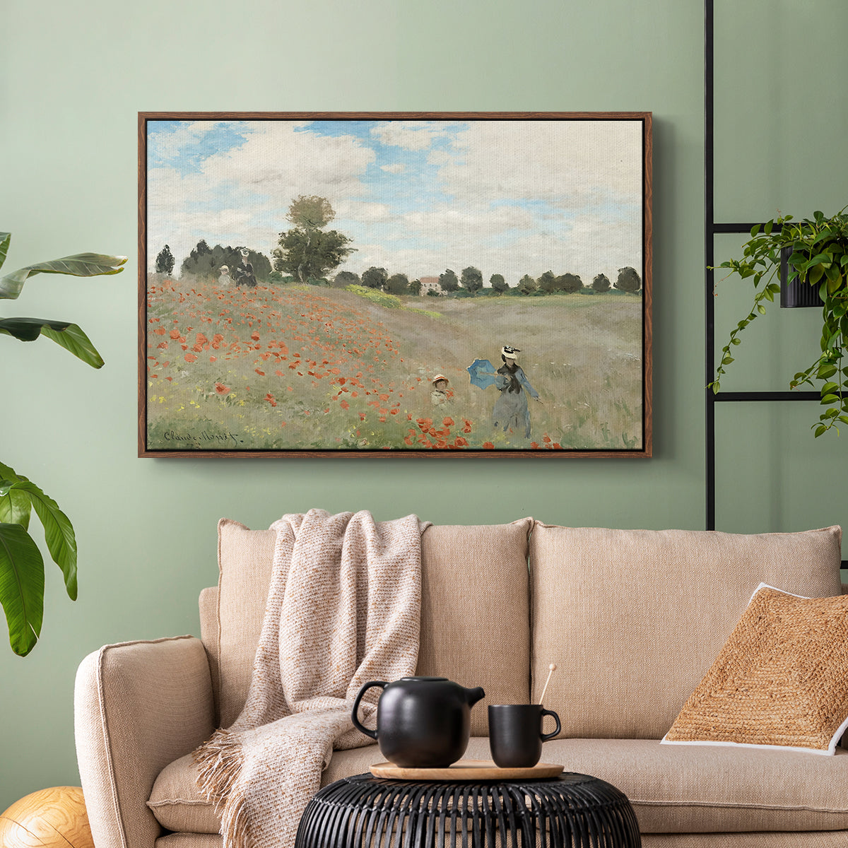 Walnut floater framed canvas featuring a rural landscape with scattered figures among blooming flowers, displayed above a sofa in a modern living room.