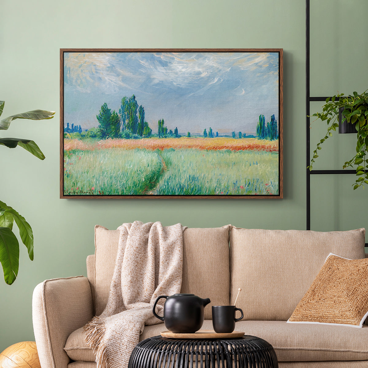 Walnut floater framed canvas featuring a serene rural scene with textured wheat under natural light, displayed above a sofa in a modern living room.