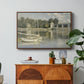 The Bridge at Argenteuil, 1874 by Claude Monet in a walnut floater framed canvas featuring a bridge spanning river with sailboats and reflections in water, displayed above a wood console cabinet.