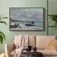 Walnut floater framed canvas featuring an impressionist seaside gathering with flags and ocean view, displayed above a sofa in a modern living room.