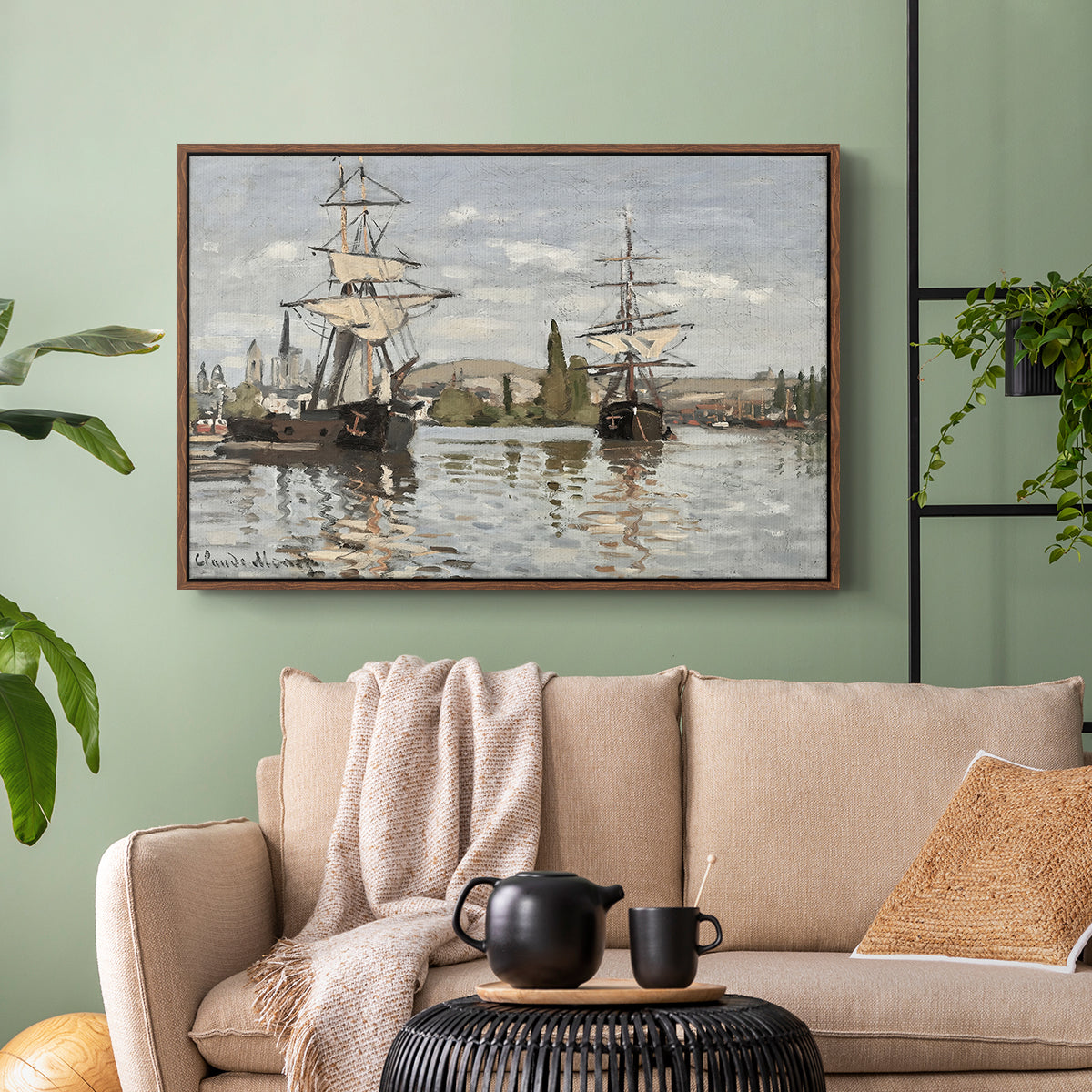 Walnut floater framed canvas featuring a nautical landscape with vessels resting on calm water, displayed above a sofa in a modern living room.