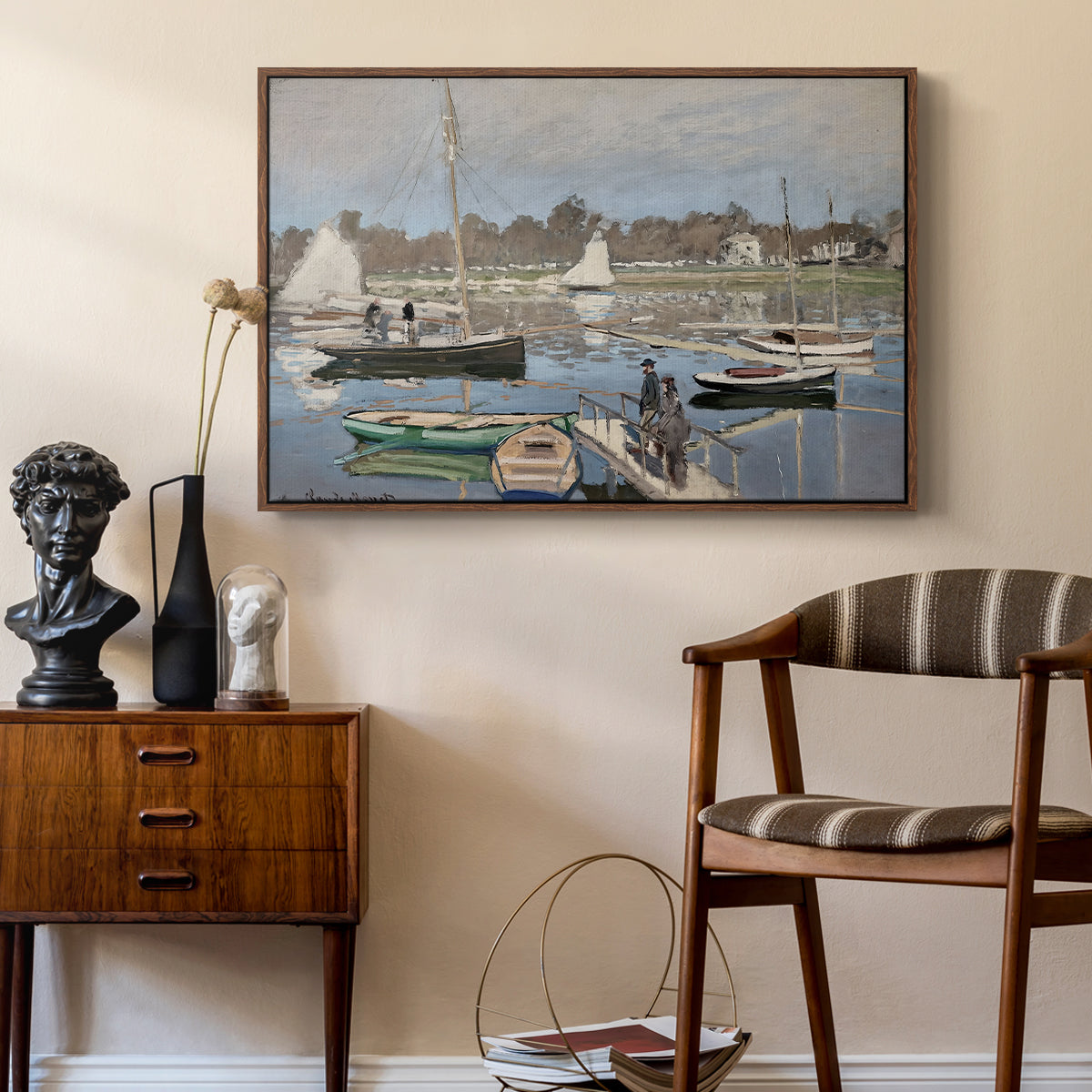 The Basin at Argenteuil, 1874 by Claude Monet as a walnut floater framed canvas featuring a harbor basin filled with boats under soft sky, styled above a mid-century console in a contemporary living area.