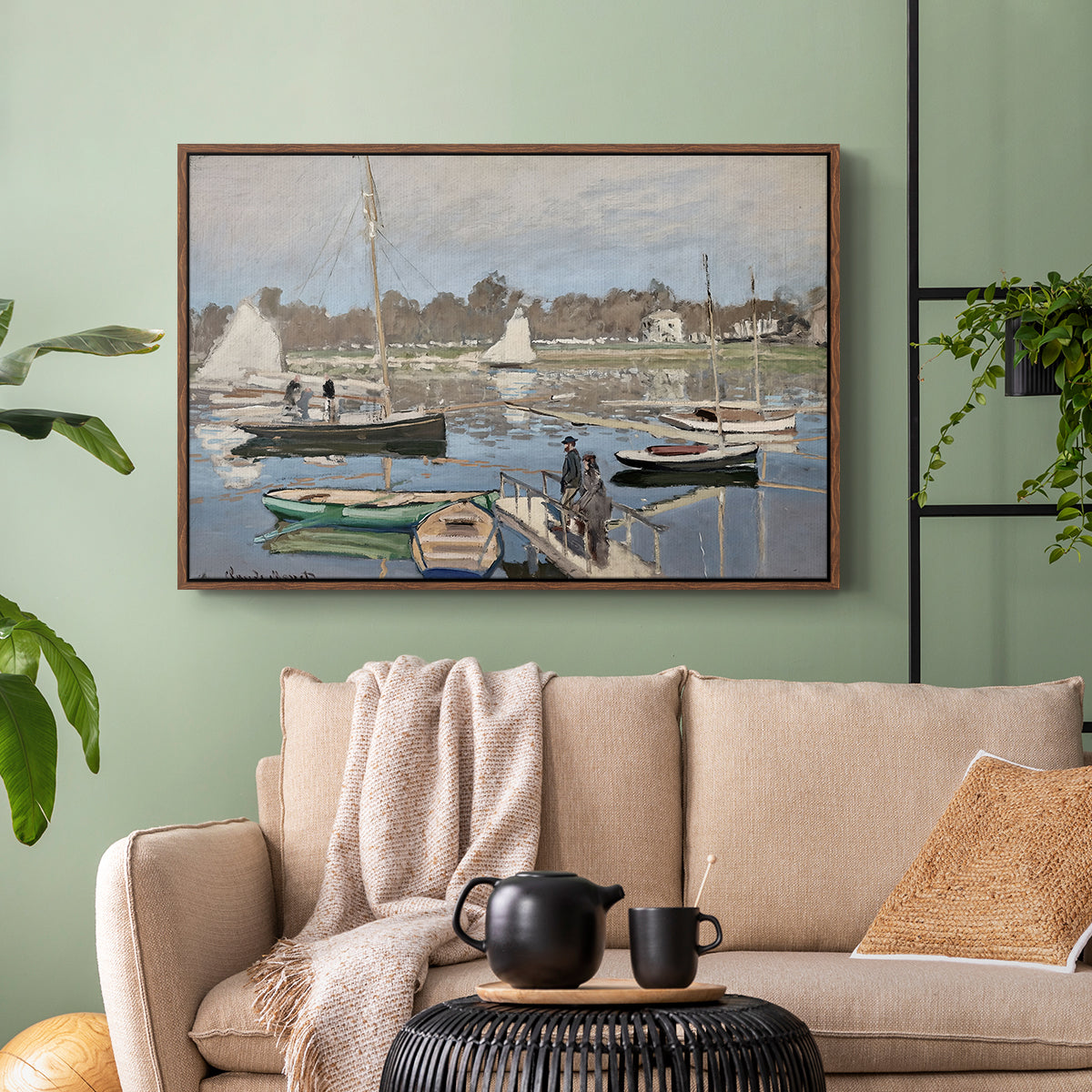 Walnut floater framed canvas featuring a tranquil river setting with sailboats and shoreline, displayed above a sofa in a modern living room.