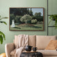 Walnut floater framed canvas featuring a tranquil garden portrait with soft natural light, displayed above a sofa in a modern living room.