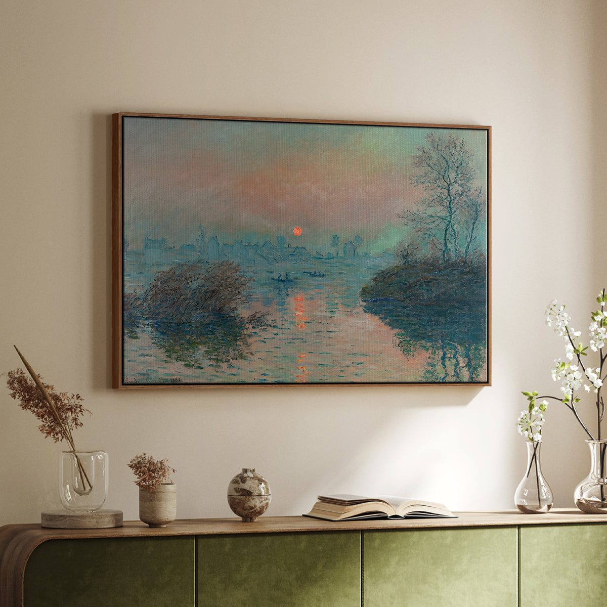Walnut floater framed canvas of Sunset on the Seine at Lavacourt, Winter Effect, 1880 by Claude Monet, featuring a winter scene with warm light reflecting on water at dusk above a sideboard in a softly lit hallway.