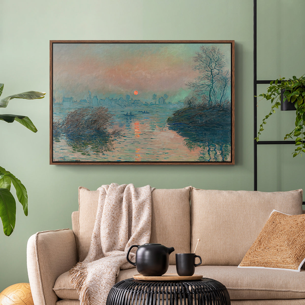 Walnut floater framed canvas featuring an atmospheric landscape combining cold tones and warm sky, displayed above a sofa in a modern living room.
