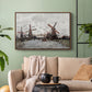 Walnut floater framed canvas featuring a landscape featuring windmills and low horizon sky, displayed above a sofa in a modern living room.