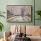 Walnut floater framed canvas featuring an urban winter landscape with muted tones and soft light, displayed above a sofa in a modern living room.