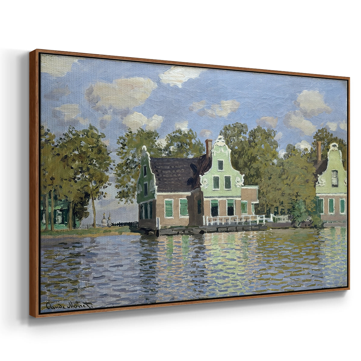 Angled view of Houses on the Zaan River at Zaandam, 1871 by Claude Monet in a walnut floater framed canvas.