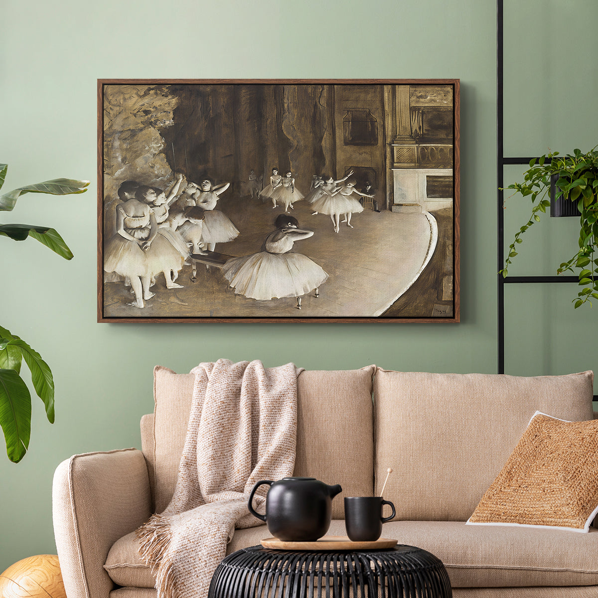 Walnut floater framed canvas featuring dancers arranged on stage with visible set and depth, displayed above a sofa in a modern living room.