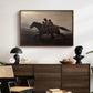 A Ride for Liberty – The Fugitive Slaves, c. 1862 by Eastman Johnson displayed in a walnut floater framed canvas above a dark wood credenza in an entryway.