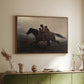 Walnut floater framed canvas of A Ride for Liberty – The Fugitive Slaves, c. 1862 by Eastman Johnson, featuring a dramatic scene of enslaved people fleeing on horseback in darkness above a sideboard in a softly lit hallway.