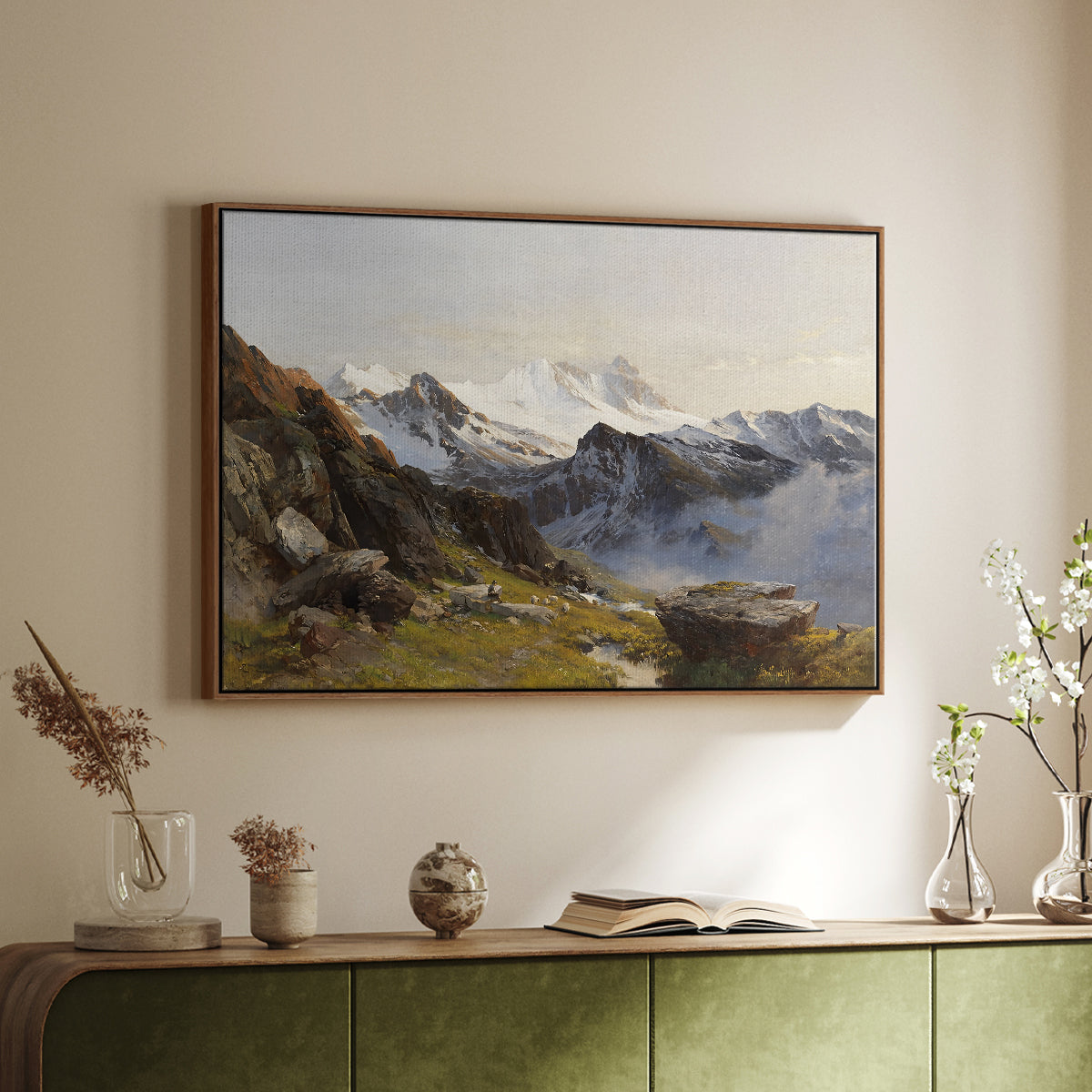 Walnut floater framed canvas of The Großglockner from the Prager Hut, 1890 by Edward Theodore Compton, featuring a mountain summit seen from elevated viewpoint with surrounding landscape above a sideboard in a softly lit hallway.