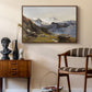 The Großglockner from the Prager Hut, 1890 by Edward Theodore Compton as a walnut floater framed canvas featuring an alpine vista with towering peak and foreground terrain, styled above a mid-century console in a contemporary living area.