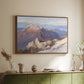 Walnut floater framed canvas of Hoher Göll from Watzmann-Hocheck, 1919 by Edward Theodore Compton, featuring an alpine panorama showing layered peaks and valleys above a sideboard in a softly lit hallway.