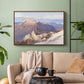 Walnut floater framed canvas featuring an expansive mountainous landscape with natural depth, displayed above a sofa in a modern living room.