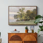 Landscape at Lake Starnberg, 1890 by Edward Theodore Compton in a walnut floater framed canvas featuring a lakeside landscape with calm water and trees along shoreline, displayed above a wood console cabinet.