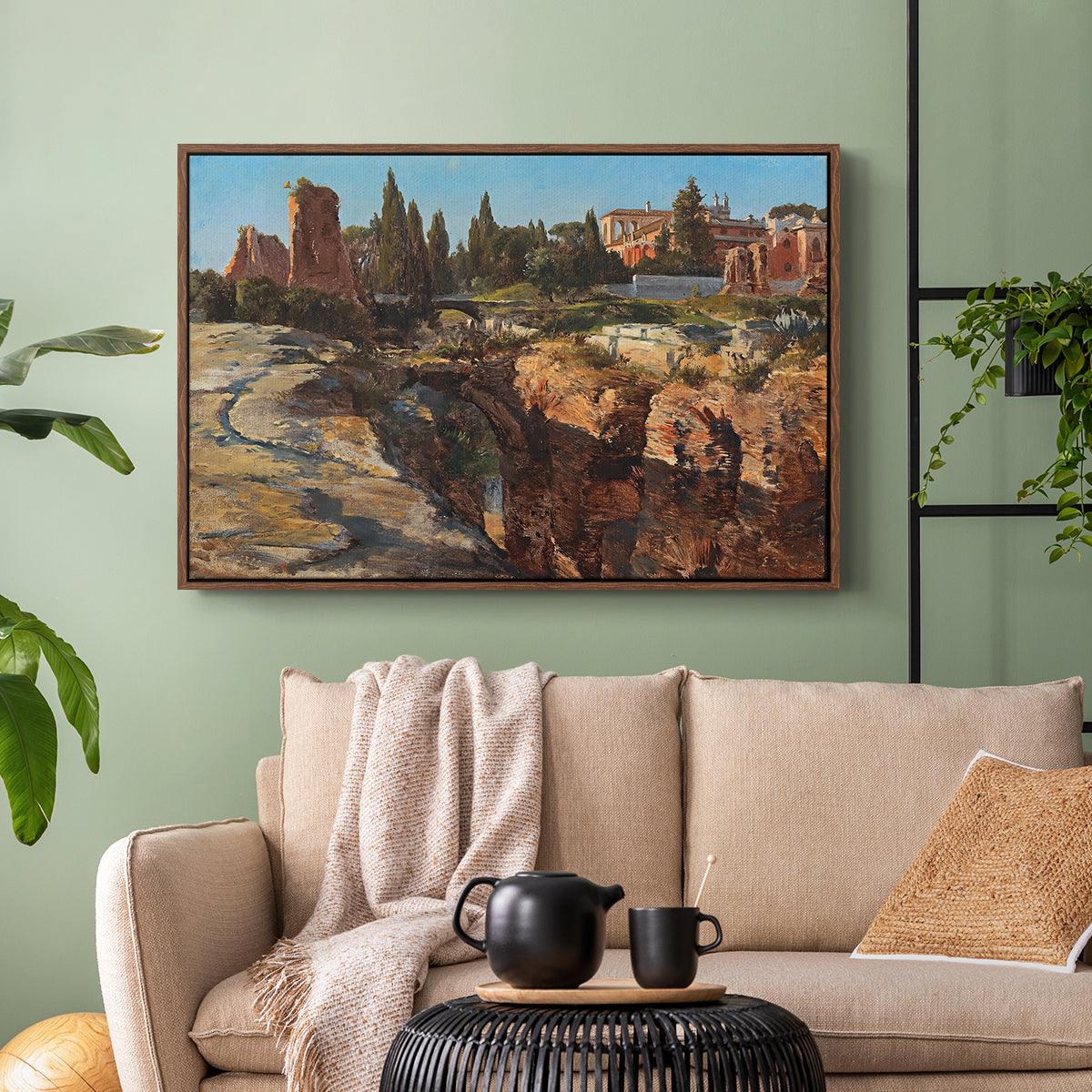 Walnut floater framed canvas featuring a detailed depiction of historic Roman architecture, displayed above a sofa in a modern living room.