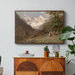 Landscape in the Caucasus, c. 1921 by Edward Theodore Compton in a walnut floater framed canvas featuring a mountainous landscape with rugged terrain and distant peaks, displayed above a wood console cabinet.