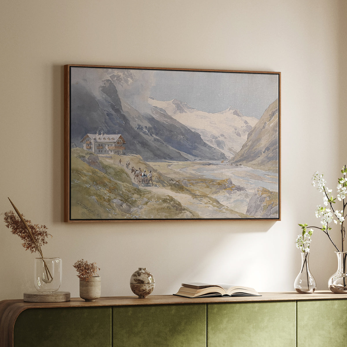 Walnut floater framed canvas of Shepherds (Pasterze), c. 1921 by Edward Theodore Compton, featuring a pastoral mountain scene with figures tending livestock above a sideboard in a softly lit hallway.