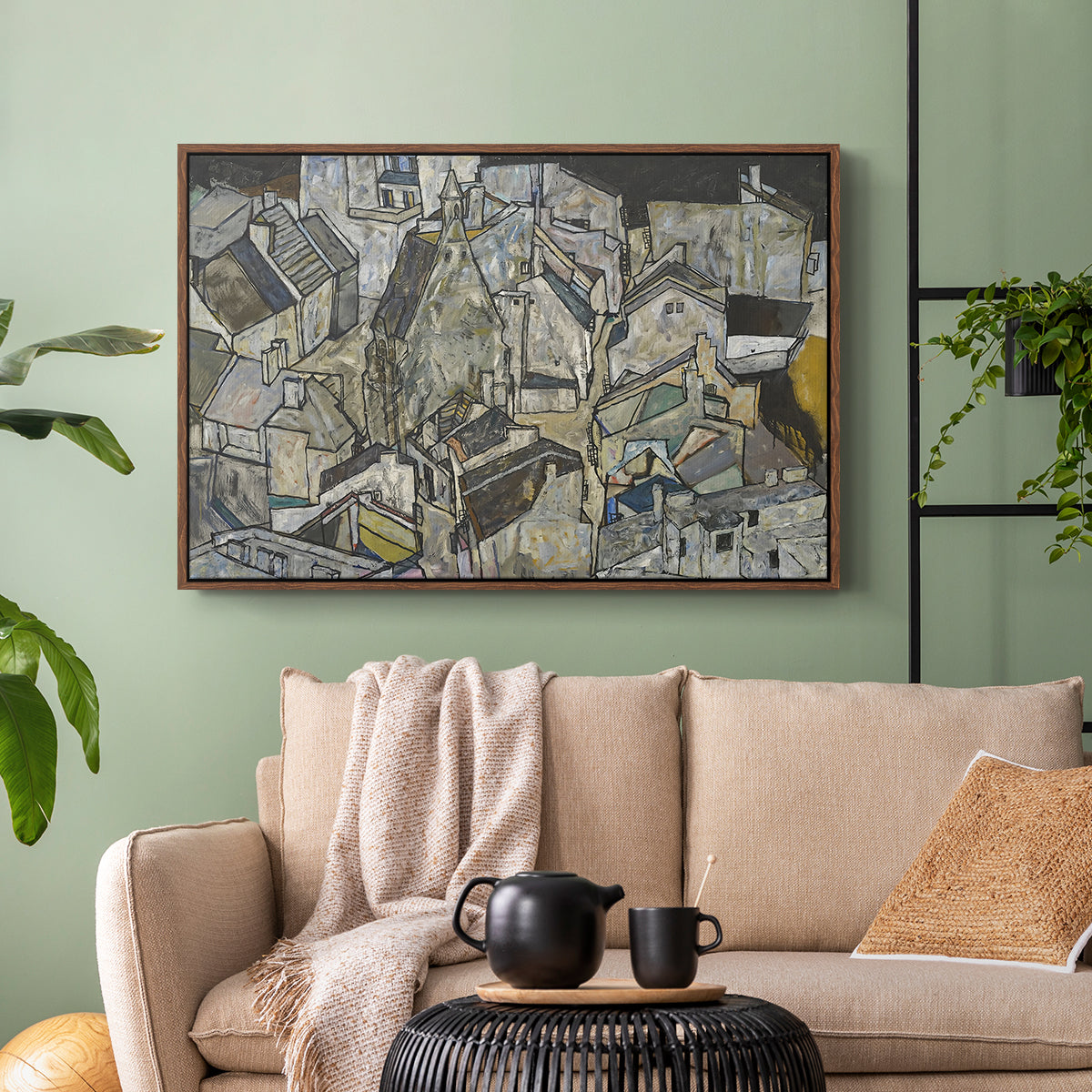 Walnut floater framed canvas featuring a stylized urban composition with geometric structures and muted tones, displayed above a sofa in a modern living room.