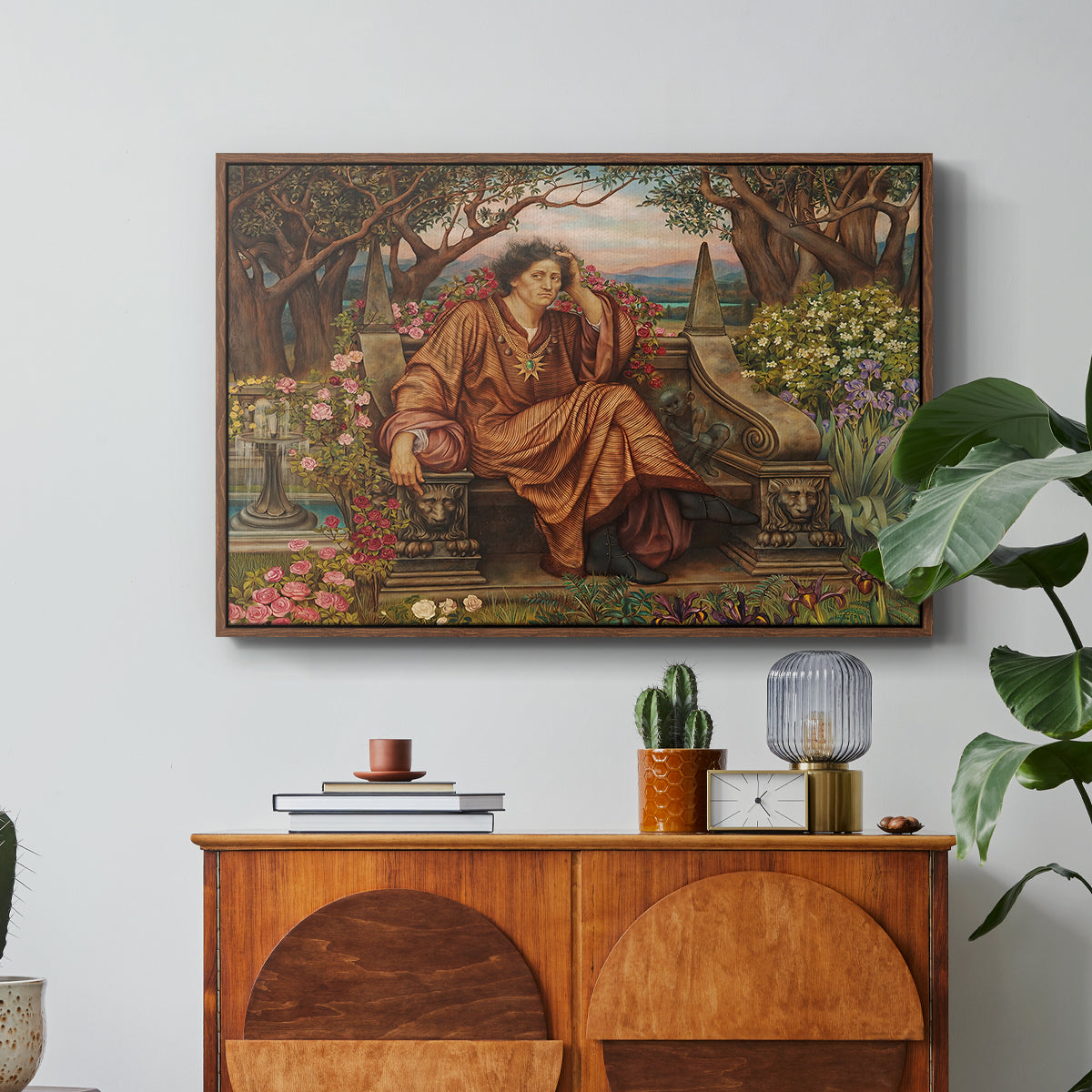 A Soul in Hell, c. 1901-1902 by Evelyn De Morgan in a walnut floater framed canvas featuring a distressed figure surrounded by flames and torment in symbolic hell scene, displayed above a wood console cabinet.