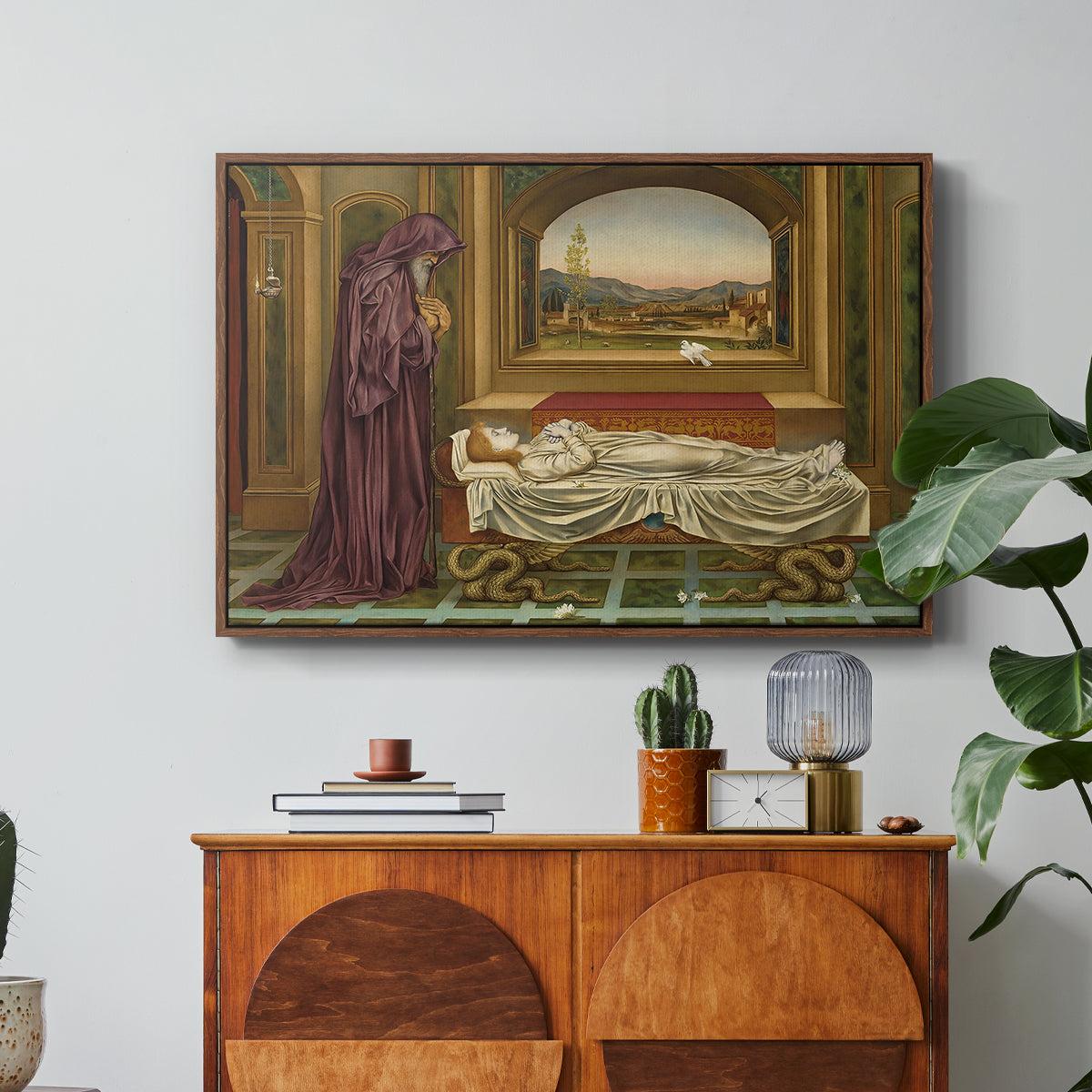 The Wandering Jew: Whom the Gods Love Die Young, 1888 by Evelyn De Morgan in a walnut floater framed canvas featuring a solitary figure standing in interior space with contemplative expression, displayed above a wood console cabinet.