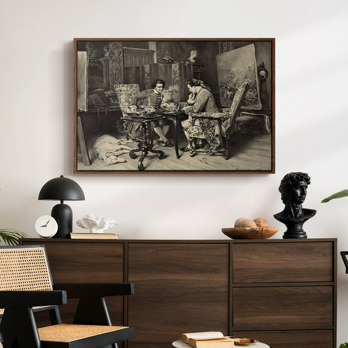 The Chess Players, 1858 by Ernest Meissonier displayed in a walnut floater framed canvas above a dark wood credenza in an entryway.