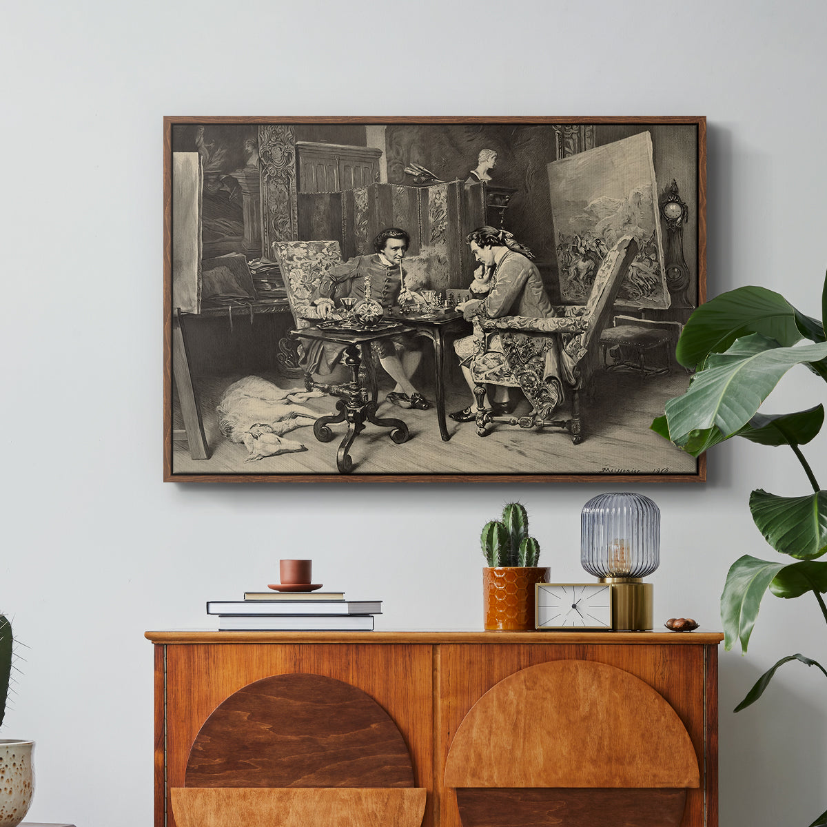 The Chess Players, 1858 by Ernest Meissonier in a walnut floater framed canvas featuring two men seated at table playing chess in detailed interior setting, displayed above a wood console cabinet.