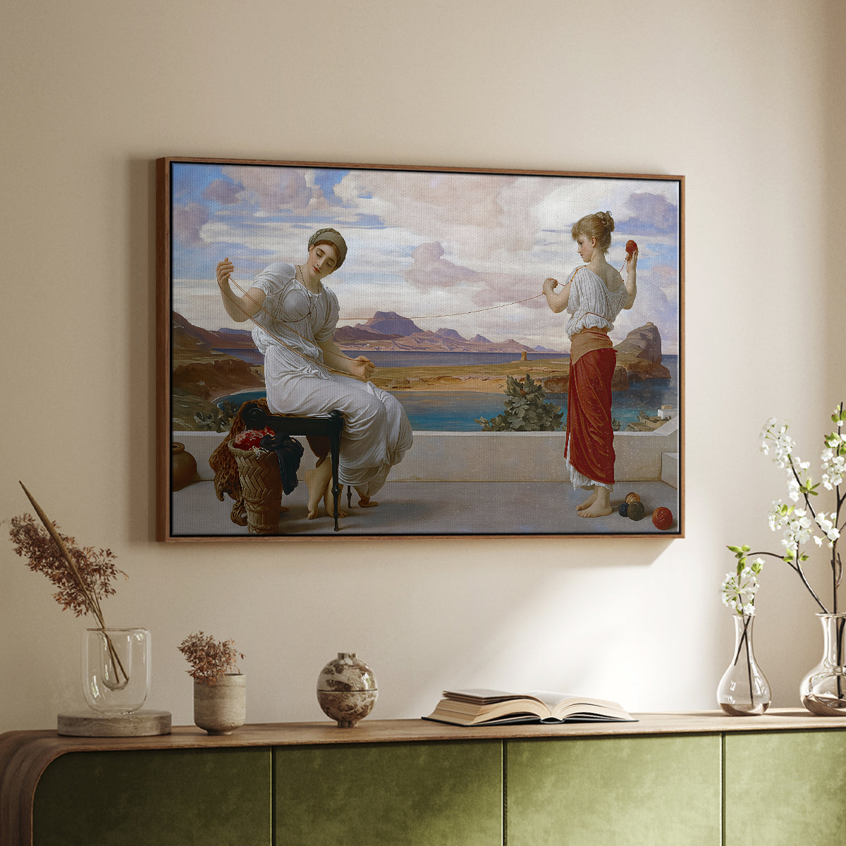 Walnut floater framed canvas of Winding the Skein, c. 1878 by Frederic Leighton, featuring two women engaged in textile work with draped garments above a sideboard in a softly lit hallway.